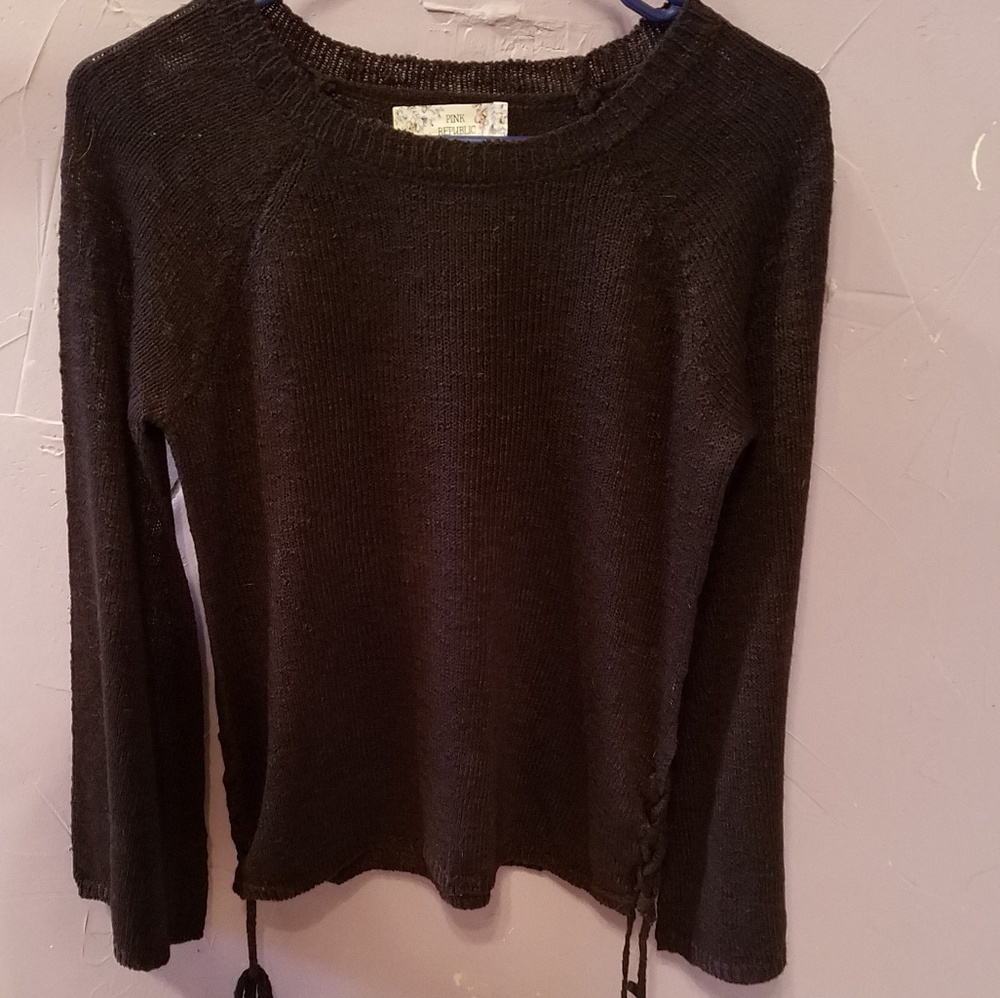 Bell-sleeved black top